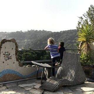 Kids talking looking out over ravine