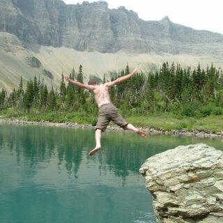 diving off rock at glacier national park