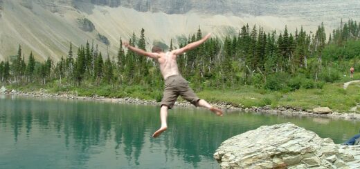 diving off rock at glacier national park